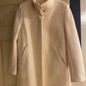 Cream colored boiled wool knee length coat